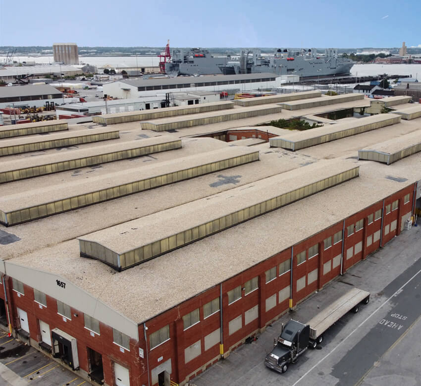 drone shot of highland ave warehouse